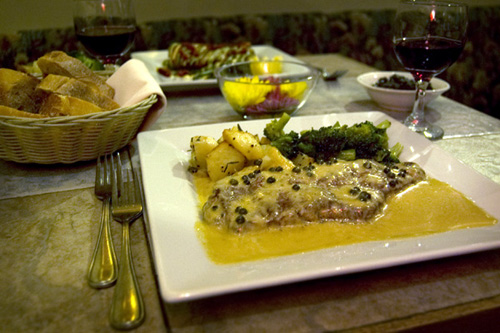 Le Nonne table with Steak italian dish